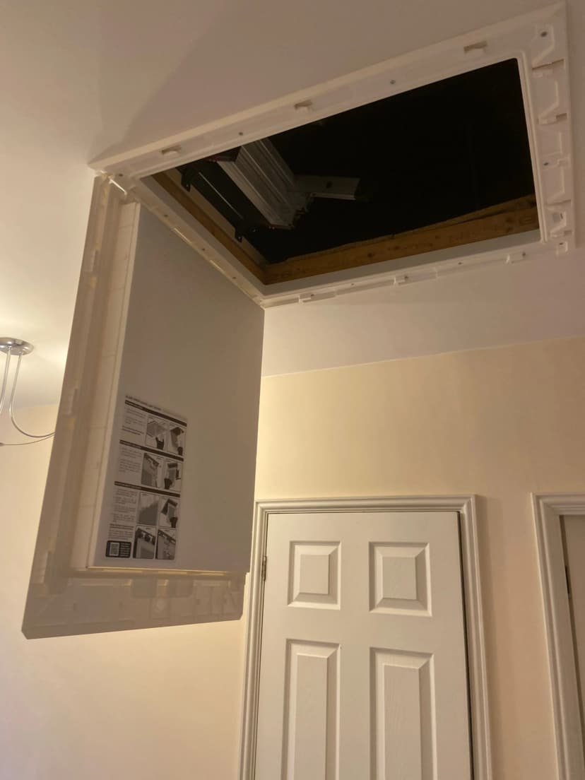 Plastic insulated loft hatch professionally installed by KMW Loft Ladders