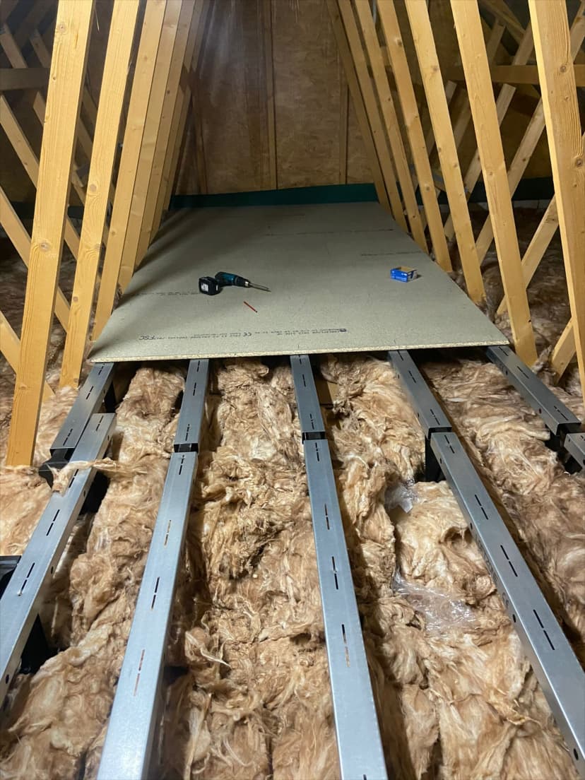 Raised loft zone boarding with insulated gaps, installed by KMW loft ladders
